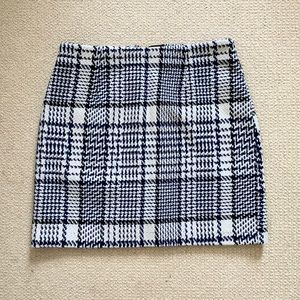 Navy, black, and white houndstooth skirt